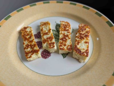 Photo of four slices of delicious-looking fried halloumi